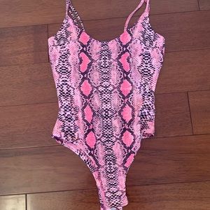 hot pink snakeskin bodysuit